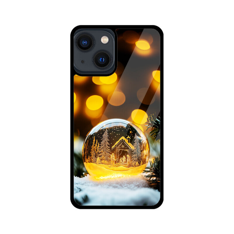 Christmas tree and house inside a glass ball