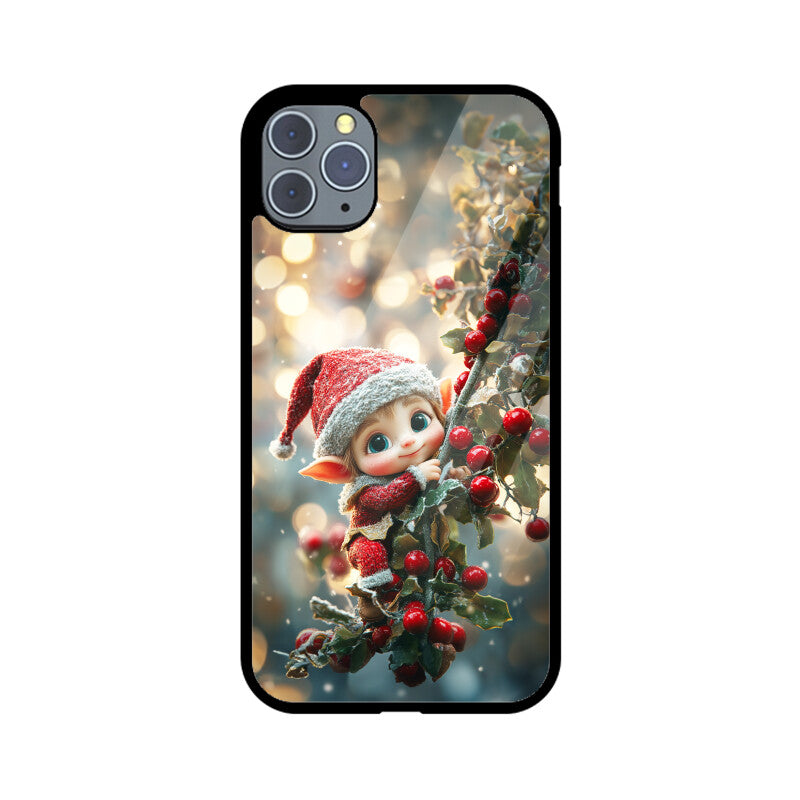 Cute elf hanging from a Christmas tree