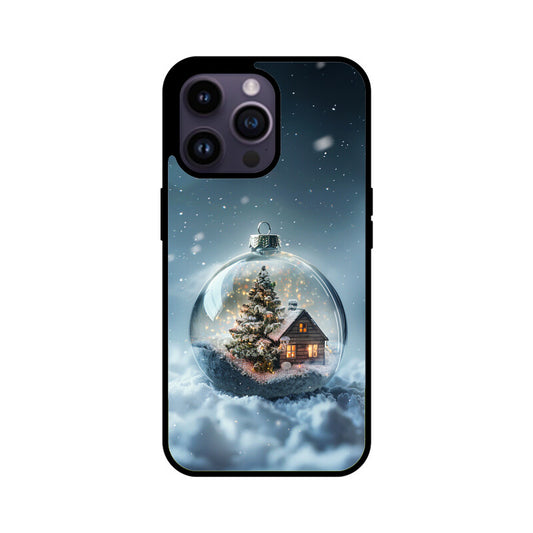 Glass Christmas ball with house and Christmas tree