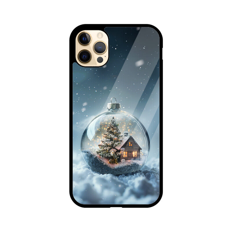 Glass Christmas ball with house and Christmas tree